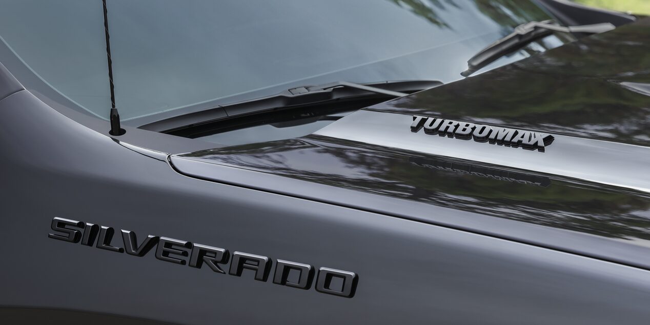 Close up view of the Silverado badging etched on the front exteriors of the 2026 Chevrolet Silverado LD.