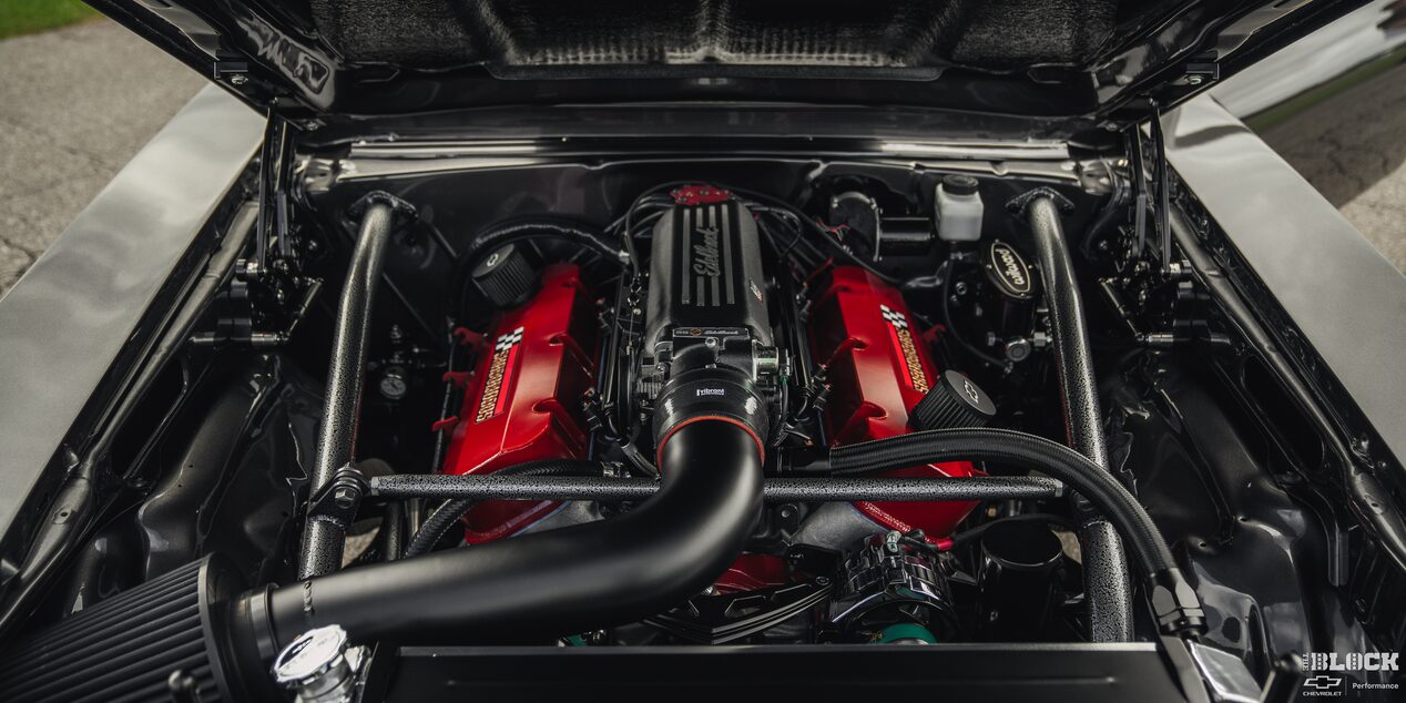 Front View of a Car Engine with the Front Hood Open