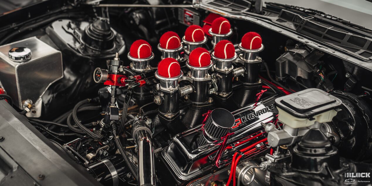 Three Quarters View of an Engine with Red Cylinder on Top