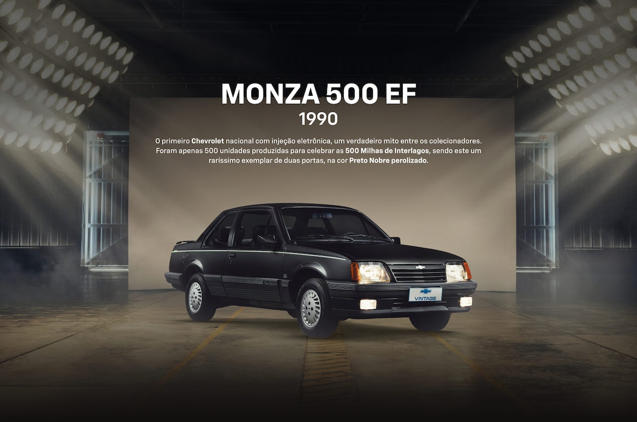 Chevrolet Omega CD Irmscher prata fotografado em estúdio, com iluminação suave destacando o design elegante.