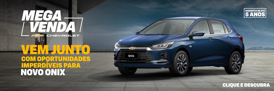 Banner promocional Mega Venda Chevrolet com Chevrolet Onix azul visto de frente e lateral direita, estacionado em piso de concreto. À esquerda, texto em destaque: Vem junto com oportunidades imperdíveis para Novo Onix – a partir de R$ 84.990 ou entrada de R$ 52.450 e 48 parcelas de R$ 990. No canto superior direito, selo de garantia de até 5 anos.