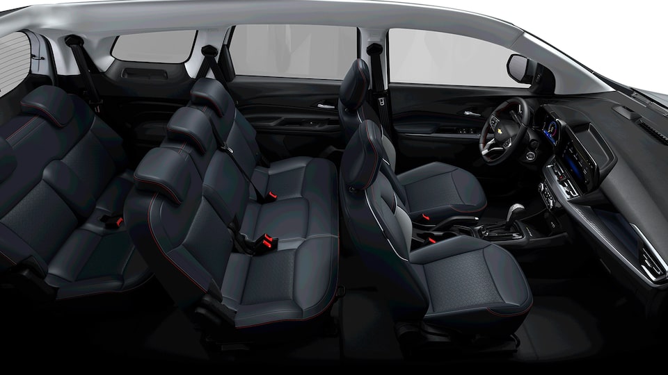 Imagem do interior do novo Chevrolet Spin, versão premier, com os 7 bancos disponíveis.