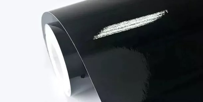 Película de envelopamento preto piano brilhante