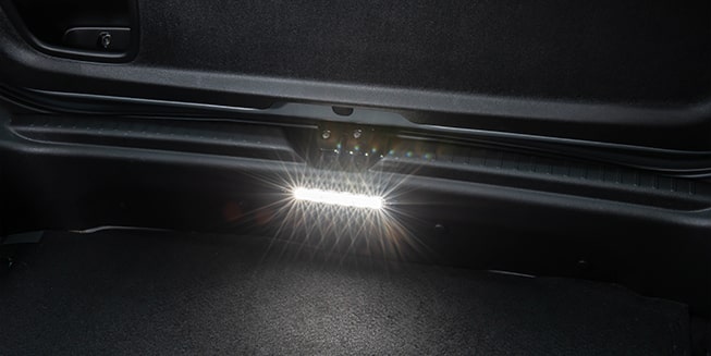 Iluminação auxiliar de porta-malas