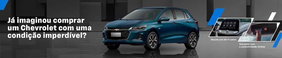 Propaganda da Chevrolet apresentando um carro azul escuro sobre fundo geométrico cinza. O texto diz "Já imaginou comprar um Chevrolet com uma condição imperdível?".