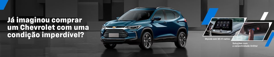 Propaganda da Chevrolet apresentando um SUV azul escuro sobre fundo geométrico cinza. O texto diz "Já imaginou comprar um Chevrolet com uma condição imperdível?".