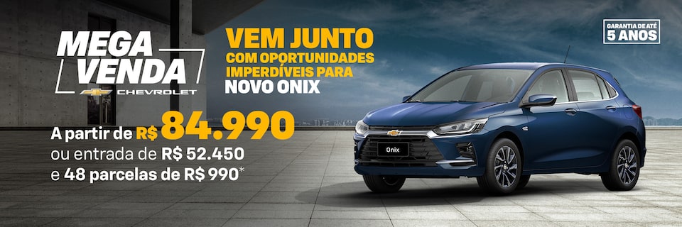 Banner promocional Mega Venda Chevrolet com Chevrolet Onix azul visto de frente e lateral direita, estacionado em piso de concreto. À esquerda, texto em destaque: Vem junto com oportunidades imperdíveis para Novo Onix – a partir de R$ 84.990 ou entrada de R$ 52.450 e 48 parcelas de R$ 990. No canto superior direito, selo de garantia de até 5 anos.