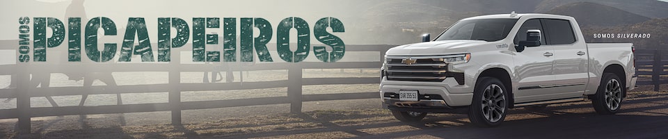 Propaganda da Chevrolet apresentando uma picape branca sobre fundo no campo. O texto diz "Somos picapeiros".
