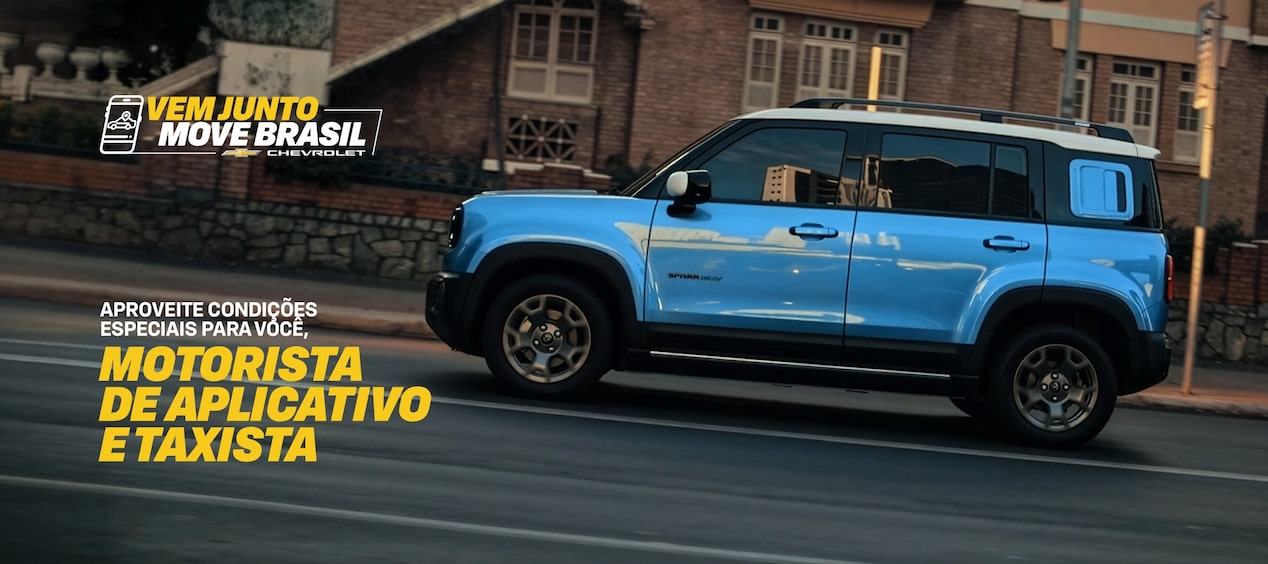 Uma Spark EV na rua com uns copys que dizem Aproveite condições especiais para você. Motorista de aplicativo e taxistas