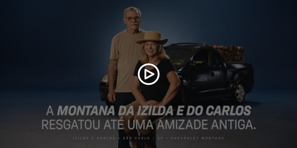 Um homem e uma mulher chamados Izilda e Carlos representando uma história com uma Montana Chevrolet