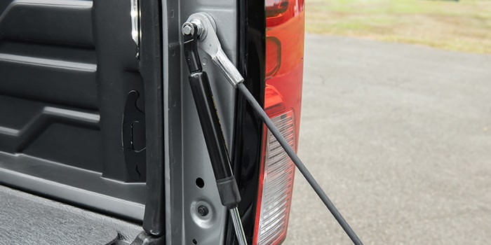 Amortecedor tampa de caçamba S10