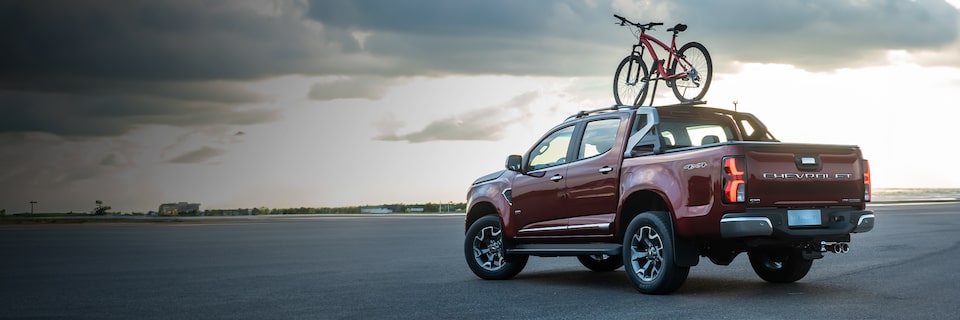 Uma S10 com uma bicicleta em cima, representando os acessórios