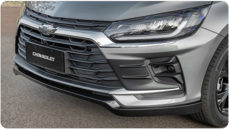 Extensor de para-choque dianteiro do Chevrolet Onix Plus para a respectiva página de acessórios.