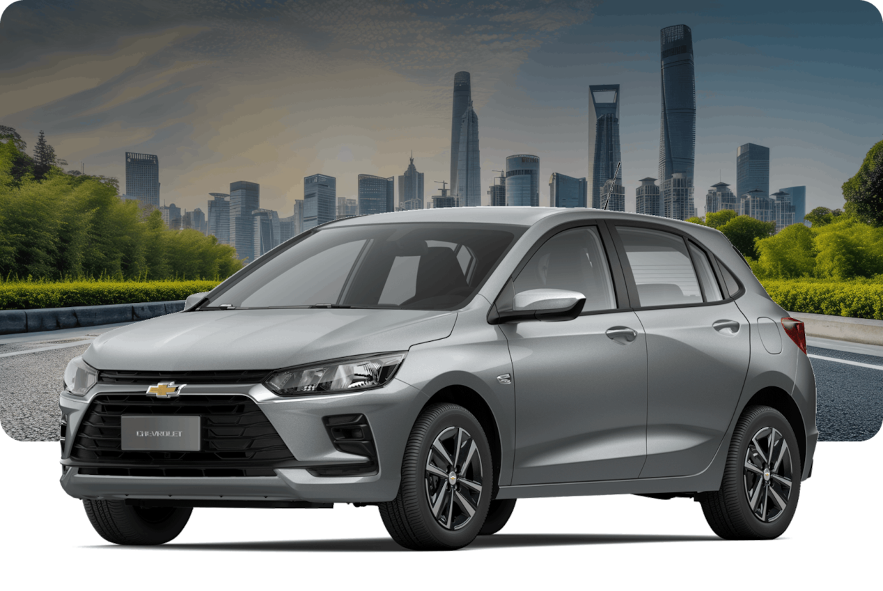 Chevrolet Onix LT Turbo na cor Prata Shark, em avenida com prédios ao fundo.