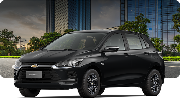 CGI do Chevrolet Onix ECO posicionado diante de uma imagem de um ambiente urbano repleto de prédios espelhados e de algumas árvores verdes.