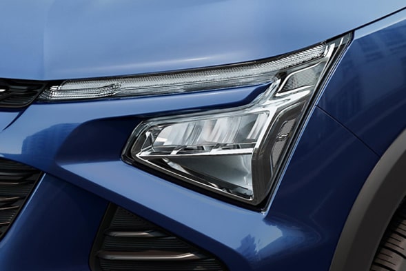 Detalhe do farol dianteiro do Chevrolet Spin 2027.