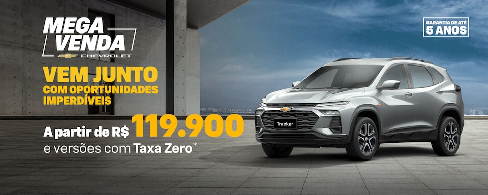 Banner promocional Mega Venda Chevrolet com Chevrolet Tracker prata visto de frente e lateral direita, estacionado em piso de concreto. À esquerda, texto em destaque: Vem junto com oportunidades imperdíveis para Novo Tracker – a partir de R$ 119.900 e versões com Taxa Zero. No canto superior direito, selo de garantia de até 5 anos.