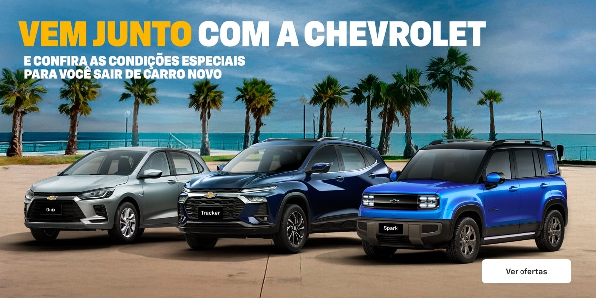 Chevrolet Onix, Tracker e Spark EUV em imagem ambientada, estacionados num calçadão com a praia e o mar ao fundo. No quadrante superior esquerdo, o texto: Vem junto com a Chevrolet e confira as condições especiais para você sair de carro novo. No quadrante inferior direito, o botão: ver ofertas.