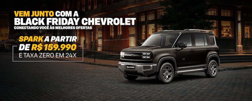 Banner da Black Friday Chevrolet com um Spark SUV estacionado em uma rua urbana à noite. O texto destaca Vem junto com a Black Friday Chevrolet, Conectando você às melhores ofertas e Spark a partir de R$159.990 e taxa zero em 24x.
