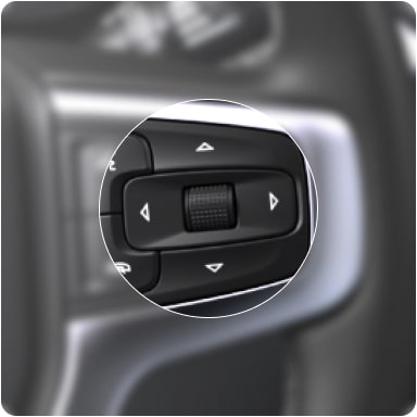Botões de acesso rápido para controle do MyLink no volante de um Chevrolet.